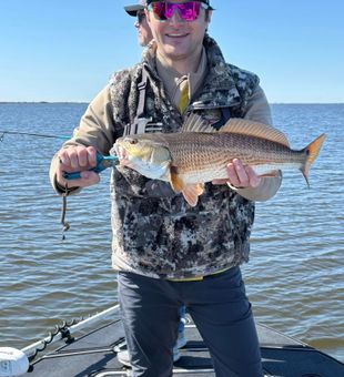 Sunshine, redfish, and laughter all day long.