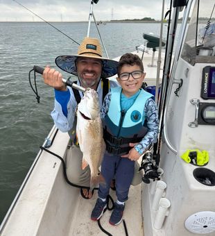 Joyful duo: Redfish catch in San Antonio