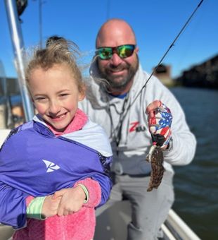 Dad and Daughter Enjoying their fishing trip! 