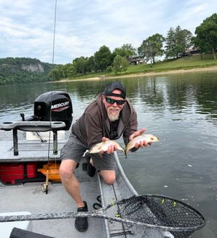 Double success fishing the waters of Cotter AR!