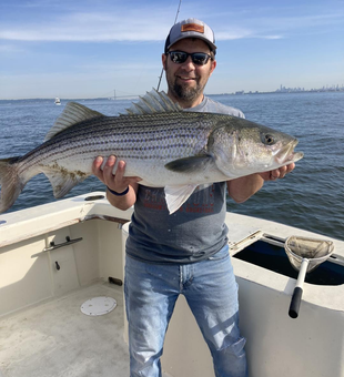 Enjoy action-packed striped bass fishing charters around Sandy Hook, NJ