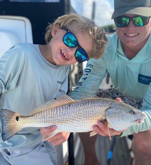Proud of his Redfish! Kids' Trip in SC 2022