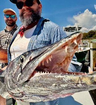 Pro Angler landing a trophy catch in Pensacola FL