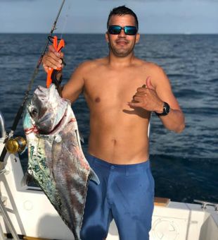 Solid African Pompano hooked offshore.