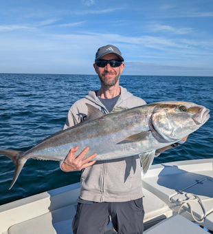 Celebrating another great catch on a St. Petersburg fishing charter.