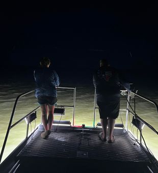 Chasing flounder under the stars.
