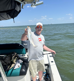 Landed a feisty Spotted Weakfish on a successful fishing trip!
