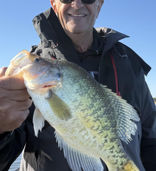 Great day jigging in Oklahoma with clear skies - perfect conditions for an exciting catch!