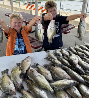 White crappie bonanza: Nine beauties caught jigging in partly cloudy skies!