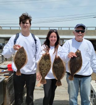 Solid flounder haul on a Somers Point NJ fishing charter
