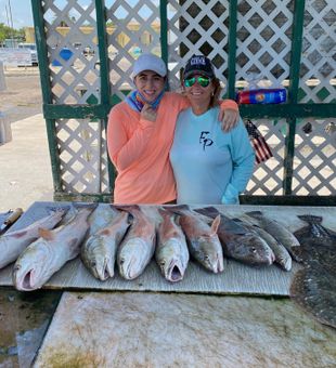Redfish and Flounder catch at the dock!