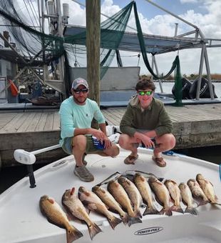 Inshore fishing in Hopedale means nonstop action targeting redfish and speckled trout in Louisiana’s rich marsh waters.