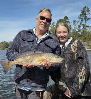 Solid redfish catch on calm inshore waters
