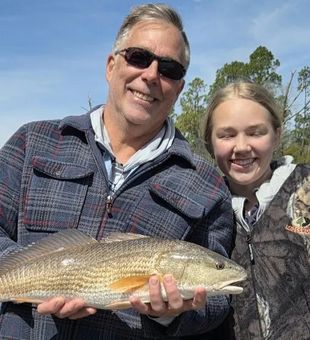 Panama City Beach redfish making the day complete!