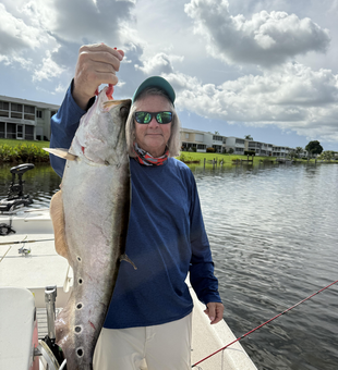 Nice catch using light tackle trolling! Partly cloudy conditions made for a great day on the water.
