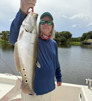 Great catch trolling with light tackle! Partly cloudy conditions made for perfect fishing weather.