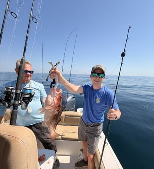 Solid grouper catch on a fishing charter