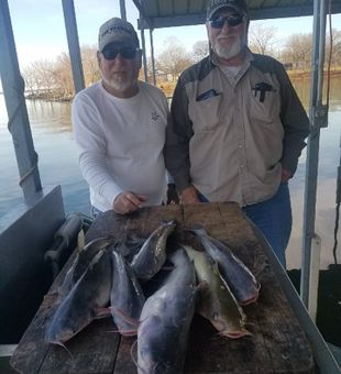 Celebrating this Catfish catch with a smile!