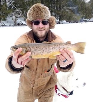 Stay warm, catch big—Maine ice fishing trips.