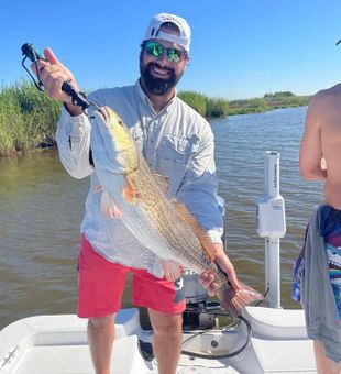 Louisiana Fishing Charter: Redfish Adventure