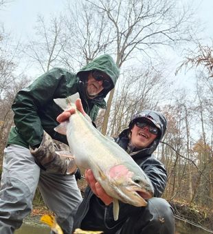 Hooked, fought, landed—rainbow success!