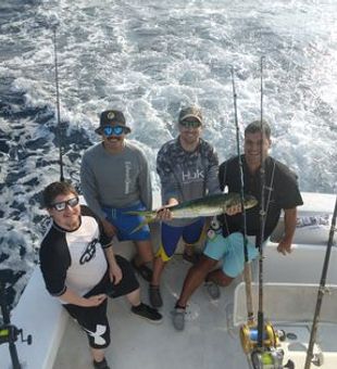Hooked on fishing trips. Caught Mahi mahi