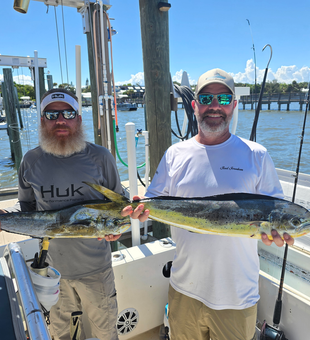 Nice pair of Mahi Mahi using deep sea jigging and trolling techniques in clear conditions!