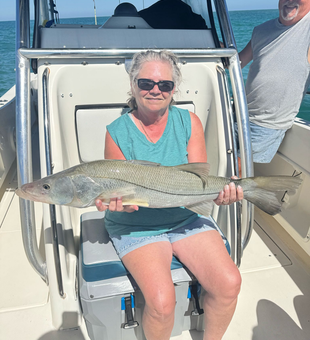 Reeling in the big one on the open waters!