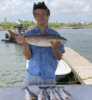 Solid redfish catch on the dock!