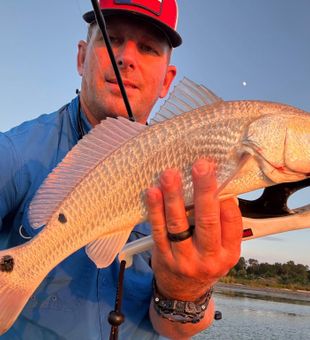 Beautiful Aransas Pass redfish making the trip memorable!