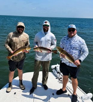 Triple redfish success in Corpus Christi waters!