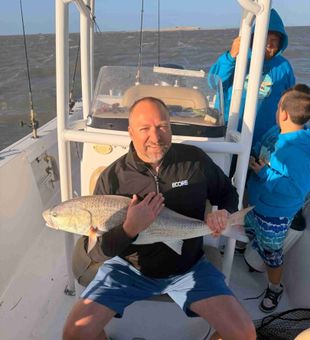 Sunset and a big Redfish -Manteo, NC.
