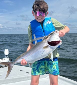 Guiding youngsters catch their trophy fish