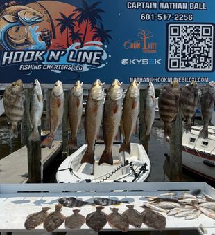 Mixed bag of redfish, sheepshead, and speckled trout from Biloxi!