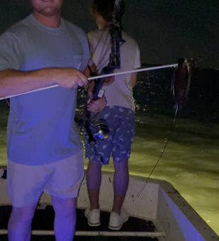 Partly cloudy skies set the stage for an exciting bow fishing adventure!