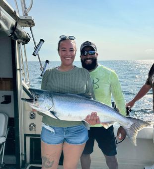 Nice Chinook salmon catch on offshore fishing charter boat