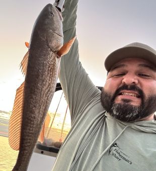 Sight-casting to powerful redfish in the shallow waters of Port O’Connor.