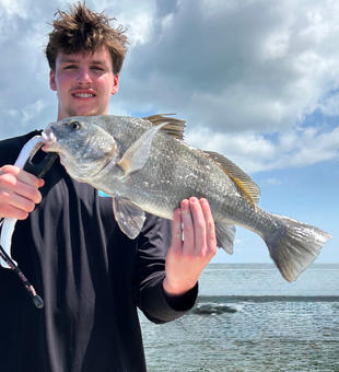 Reeled in this massive Black Drum on a partly cloudy day with some heavy and light tackle action!
