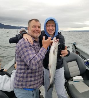 Proud moment with a sleek Coho!