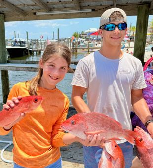 Cast into productive waters during a saltwater fishing trip in Orange Beach.