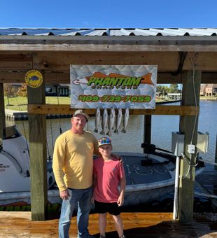 Proud family speckled trout catch on inshore fishing trip