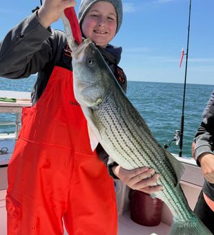 Beautiful Yarmouth striped bass making memories on the water!
