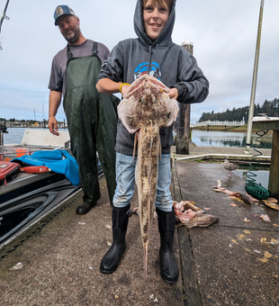 Great flatfish action at Winchester Bay! Perfect adventure fishing spot.