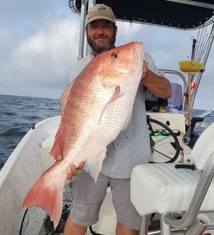 Beautiful Fort Morgan red snapper brought to the boat!