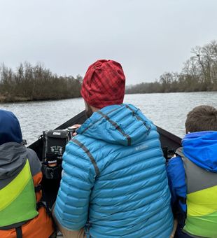 Fishing on a calm, cool river.