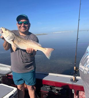 Big redfish and big smiles on the water!