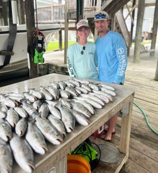 Couples limiting out on fish in LA!