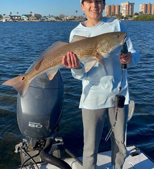 Start them young! Redfish catch for youngster.