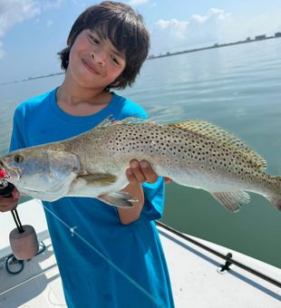 Beautiful Port Isabel speckled trout making memories on the water!