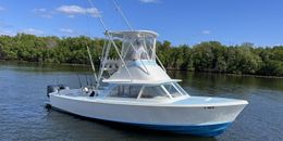 Phishunt Charters Bertram Boat image 0